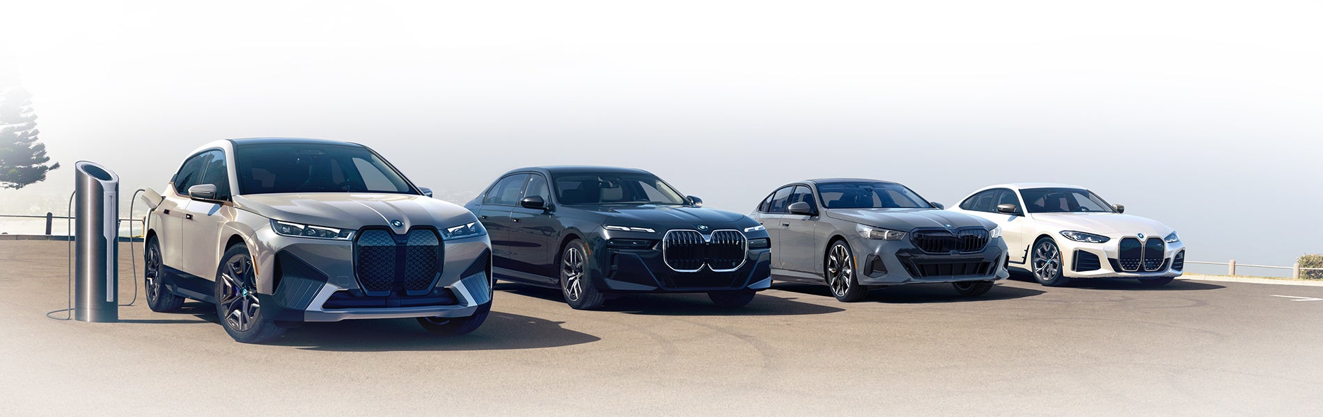Four BMW Electric Vehicles parked in parking lot