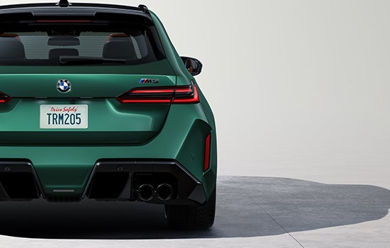 Rear shot of BMW M5 Touring showing the flared wheel arches. | Newbold BMW in O Fallon IL