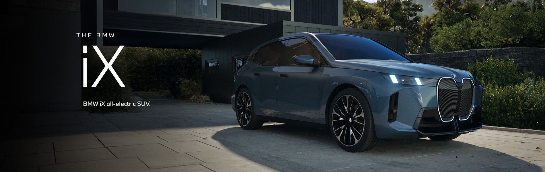 The BMW iX SUV parked. Click to learn more. | Newbold BMW in O Fallon IL