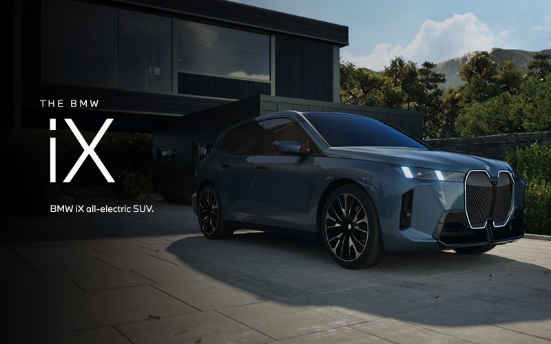 The BMW iX SUV parked. Click to learn more. | Newbold BMW in O Fallon IL