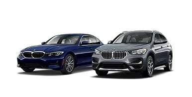 Navy blue and dark grey BMW image icons. | Newbold BMW in O Fallon IL