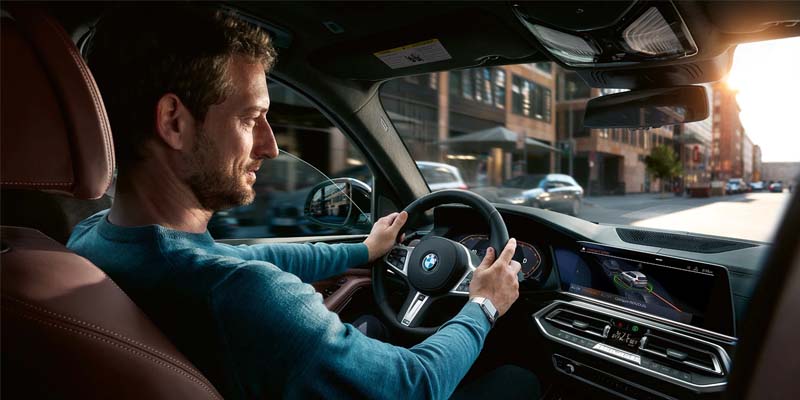 man driving BMW x5